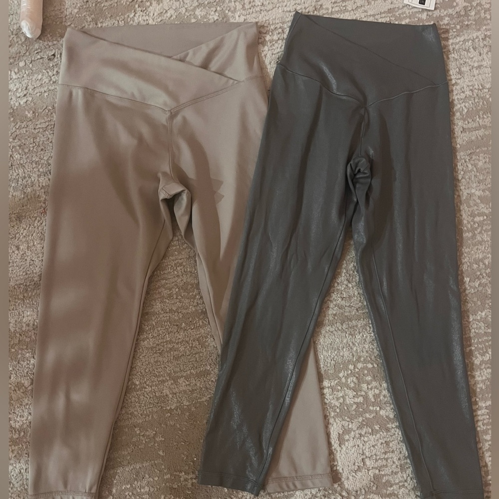 Two pairs of cris cross leggings